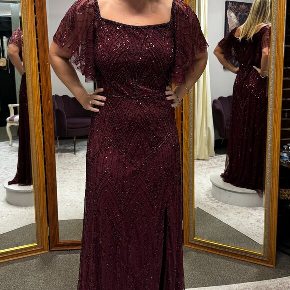 Mahogany Art Deco beaded gown with flutter sleeves and a slit A-line skirt.